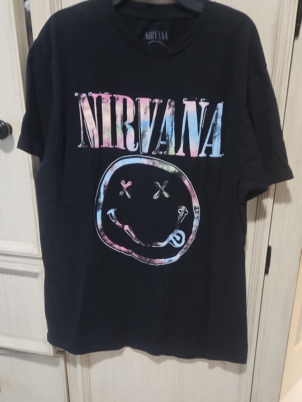 NIRVANA Black Tee with Pastel Tie-Dye Logo